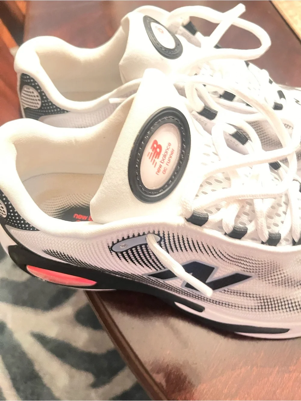 Like Preowened New Balance mens White Running Sneakers with Red Accents,size 9